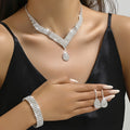A Jewelry Set Featuring 1 Pair of Dangle Earrings, a Necklace, And a Bracelet, All Adorned with a Water Drop Pendant And Rhinestones, Perfect for an Elegant And Sexy Gift for Women During for Eid