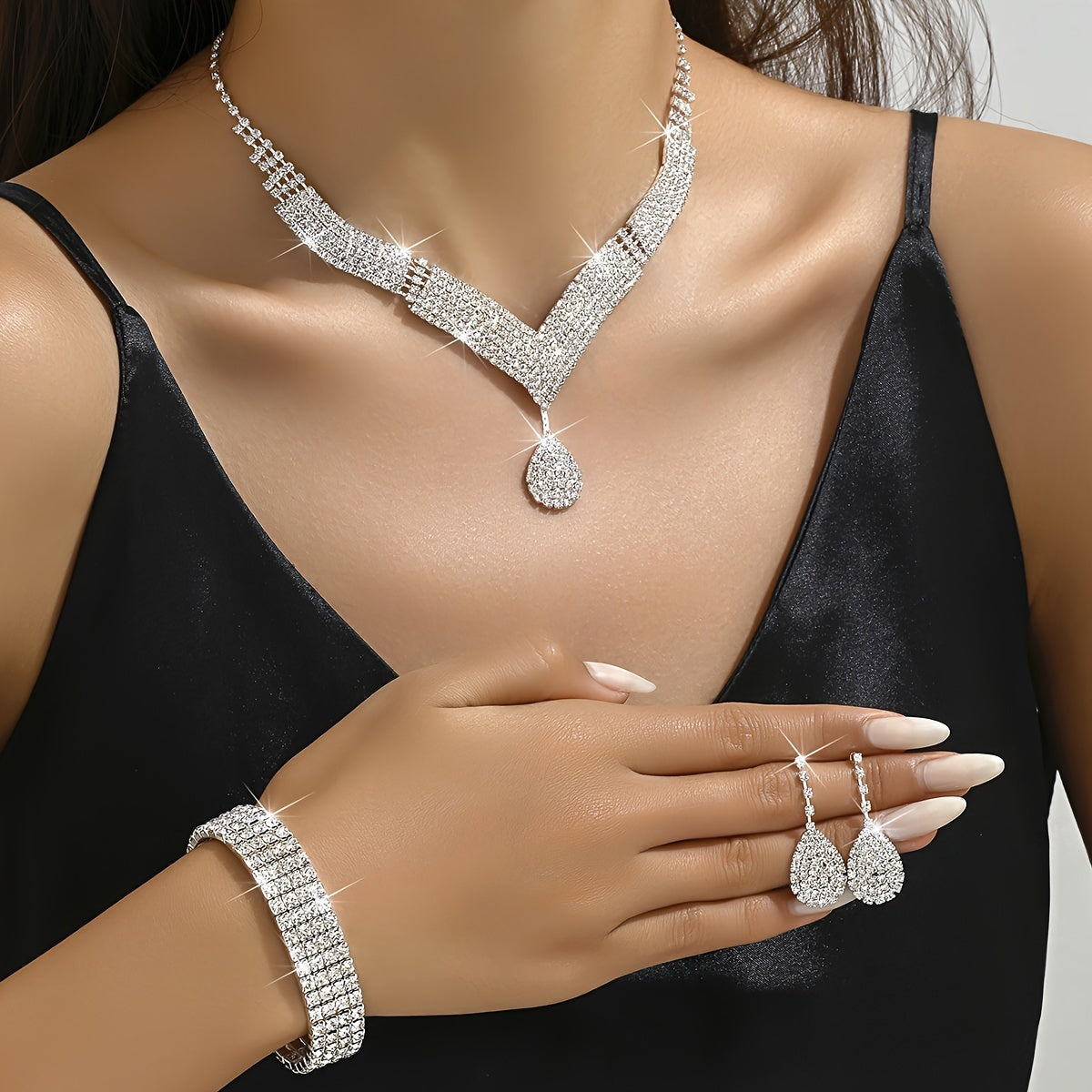 A Jewelry Set Featuring 1 Pair of Dangle Earrings, a Necklace, And a Bracelet, All Adorned with a Water Drop Pendant And Rhinestones, Perfect for an Elegant And Sexy Gift for Women During for Eid