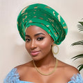 A Robust, Multi-Layered African Headscarf Hat Adorned with a Braided Crown, Perfect for a Nigerian Wedding