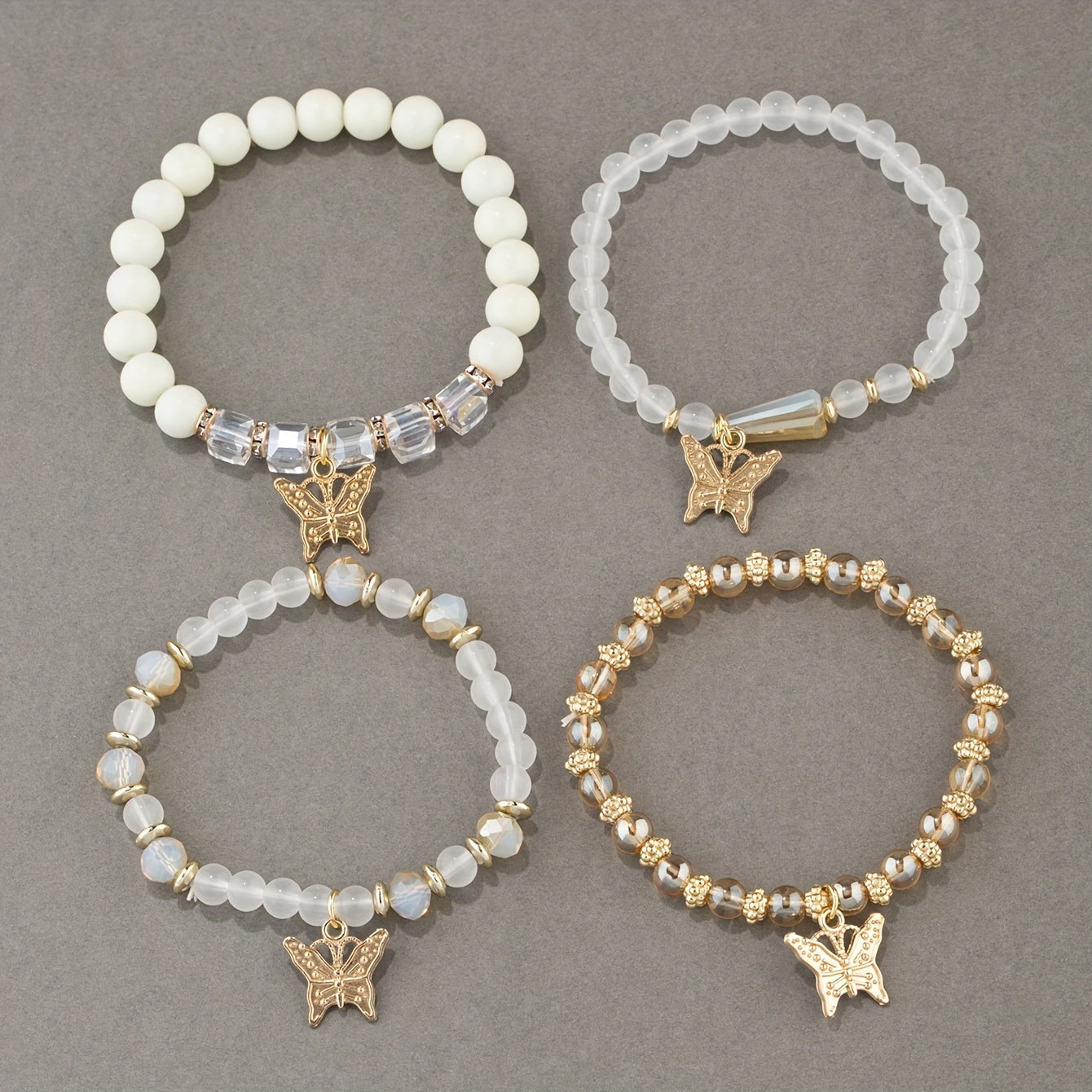 7 sets (a total of 28pcs) of multi-layer beaded stackable bracelet sets, artificial butterfly pendant jewelry sets, multi-layer beaded elastic bracelets, handmade jewelry sets -DIY beaded jewelry