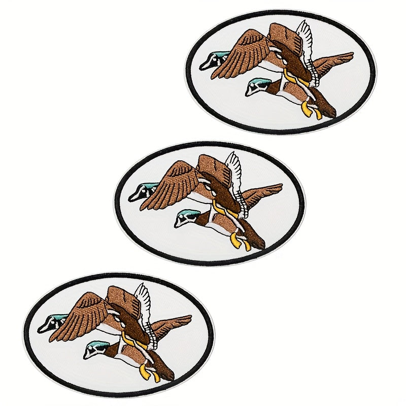 Set of 3 Retro Duck Hunting Cartoon Patches - Iron-On Or Sew-On, Made from Sturdy Polyester, Light Blue with Yellow And Green Accents, Ideal for Apparel, Jackets, And Trucker Caps - Great Gift Option