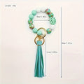 Stylish Silicone Beaded Keychain And Featuring a Leaf Charm And Tassel - Available in Floral And Solid Hues, a Trendy Accessory for Women, Perfect for The Spring And Summer Seasons