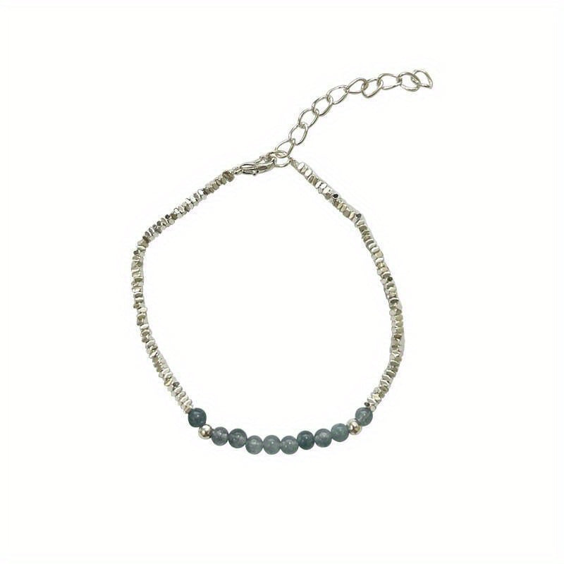 A Delicate Women'S Bracelet Made of 925 Silvery with a Fine Silvery Aquamarine Design, Showcasing a Light Luxury Aesthetic And a Unique Broken Style