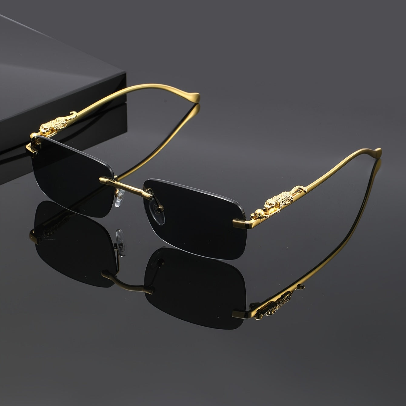 A Unique Pair of Glasses with Leopard Print Design And Frameless Square Lenses, with Glasses Case And Cleaning Cloth Suitable for Casual Gatherings And Fashionable Outfits. They Are a Perfect Photo Prop for Both Men And Women